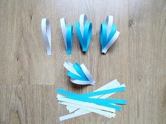 Объемная снежинка из бумажных полос. Объемная снежинка из бумажных полос.