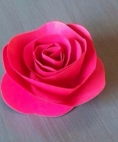 Простой способ сделать розочки из бумаги.