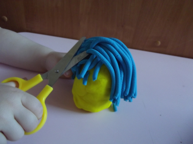 Парикмахер .