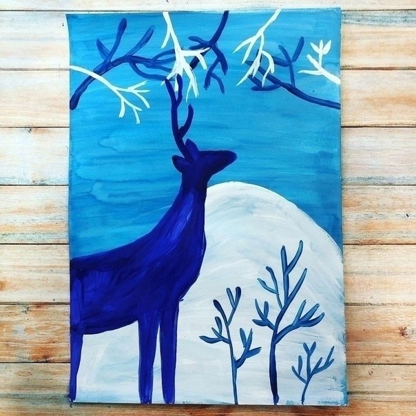 Олень в зимнем лесу