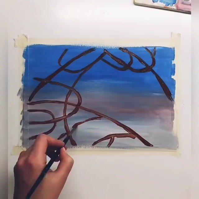 Снегирь на заснеженной ветке