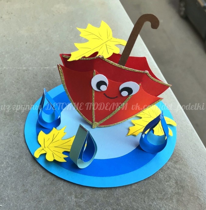 Зонтик в лужице