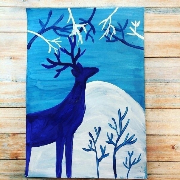 Олень в зимнем лесу