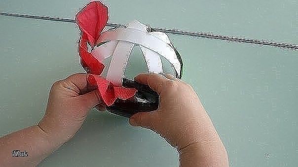 Шапочка-цветочек из бумаги