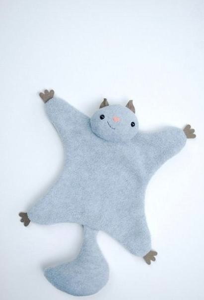 ​Милая белочка-летяга