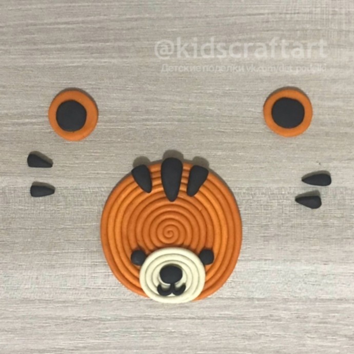 Аппликация из пластилина "Тигрёнок" Аппликация из пластилина "Тигрёнок"