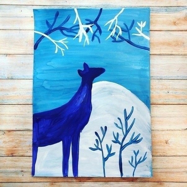 Олень в зимнем лесу