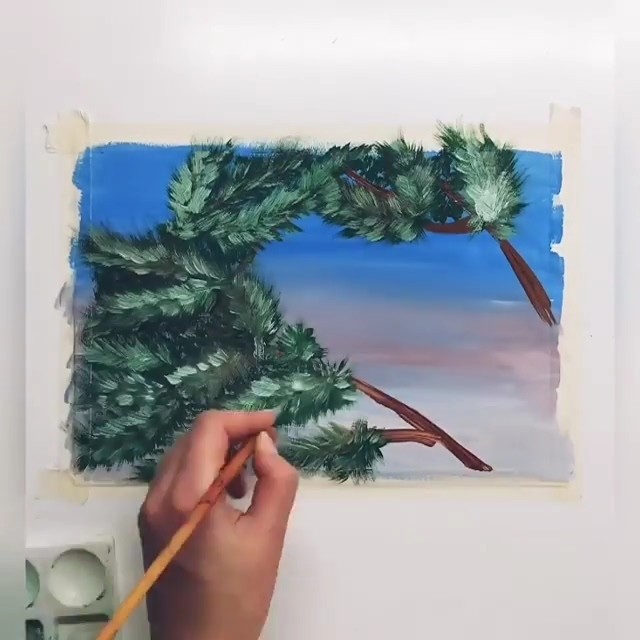 Снегирь на заснеженной ветке