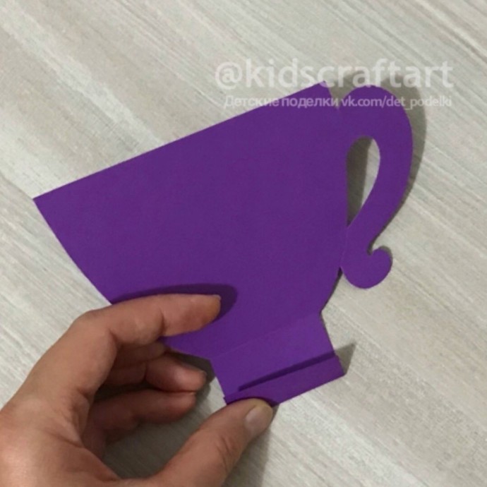 Котёнок в чашке