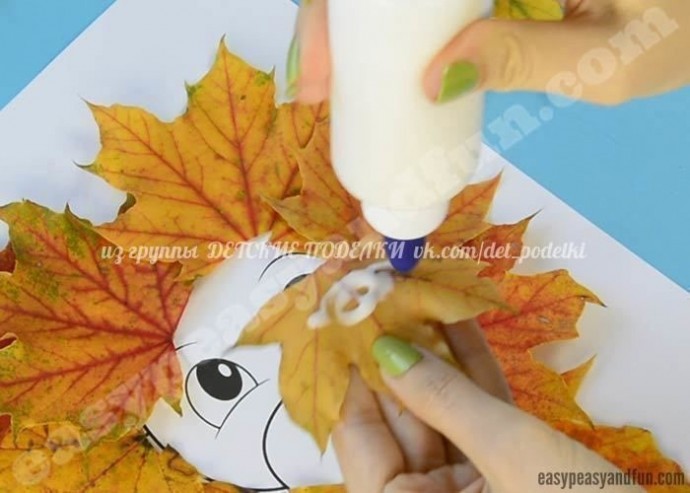 Лев с гривой из кленовых листьев Лев с гривой из кленовых листьев