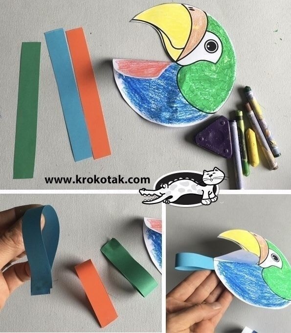 Яркие попугайчики на палочке