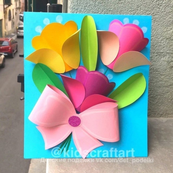 ​Букет цветов с бантом