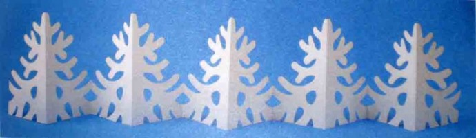 Новогодние гирлянды в технике симметричного вырезания