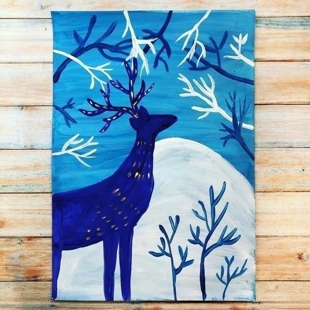 Олень в зимнем лесу